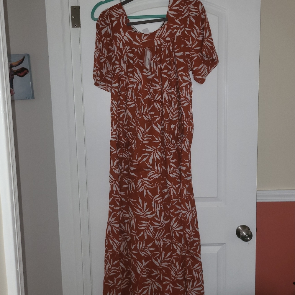 Elegant Rust Maxi Dress with Leaf Print